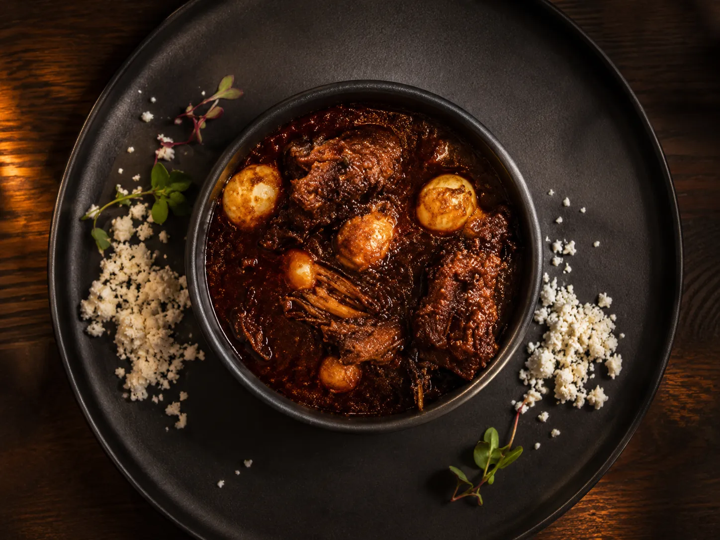 Doro Wat – slow-cooked Ethiopian chicken stew with berbere spice and boiled egg at Merkato Restaurant Winnipeg